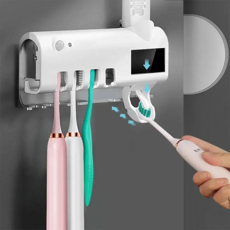 Porte-brosse à dents UV intelligent avec un support mural et un distributeur de dentifrice automatique.
